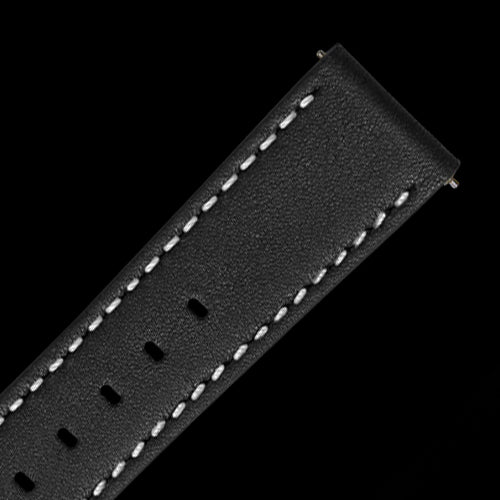 Image of black leather stiched band close up.